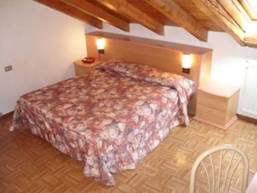 Postel nebo postele na pokoji v ubytování Hotel Europa