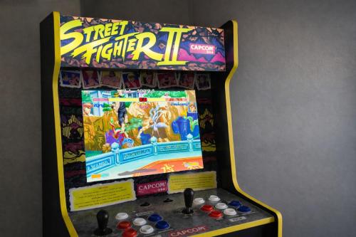 a video game machine with a super mario kart at Heart of Raleigh in Raleigh