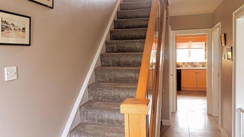 a stairway in a home with a stair case at Loughview House overlooking Carlingford lough in Warrenpoint