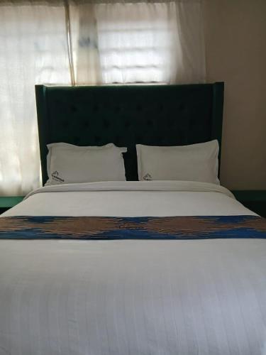 Krevet ili kreveti u jedinici u okviru objekta Classique B&B Jwaneng