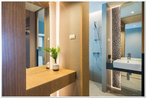 ห้องน้ำของ Sea Me Spring Tree Hotel