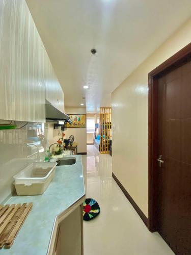 a kitchen with a sink and a counter top at LG-15B City Center Staycation at Megatower 1 in Baguio