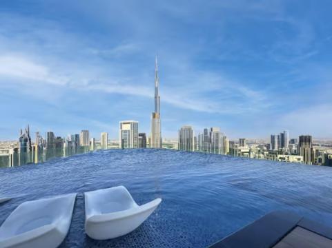 Restay Homes at Paramount Midtown Hotel - Infinity pool access included