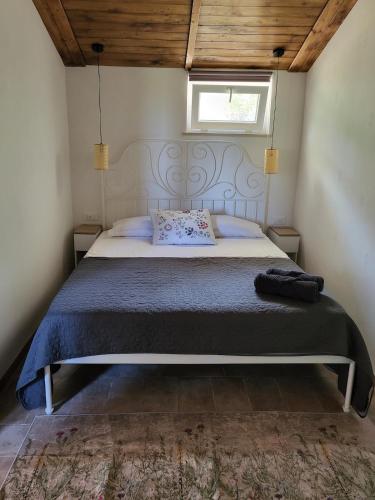 a bedroom with a large bed in a room at La Terrazza Segreta - Vista Mare in Atri