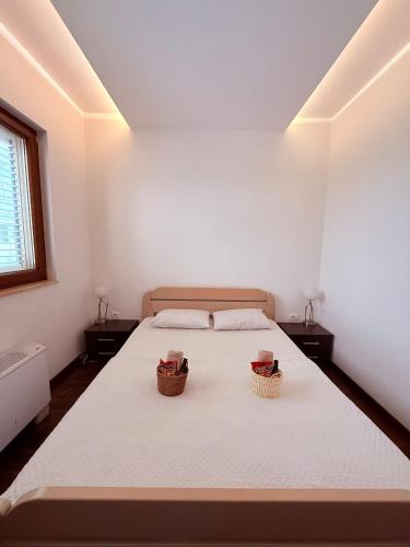 Llit o llits en una habitació de The Budva Apartment