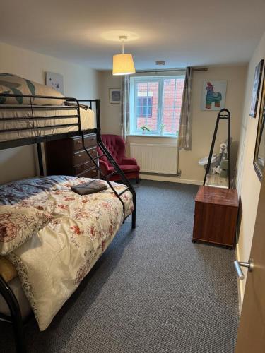 a bedroom with a bunk bed and a window at Warm, Sleeps 6, Bathroom, Beaches Shops Cafes Bars Pier, Central Ryde in Ryde