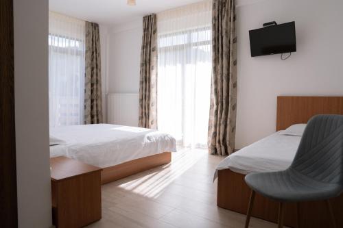 Un pat sau paturi într-o cameră la Hotel Dia Lin