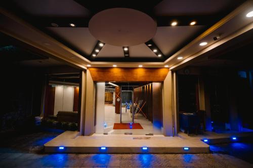 a stage with a large mirror on the ceiling at Royal Hotel Khulna - City Center in Khulna