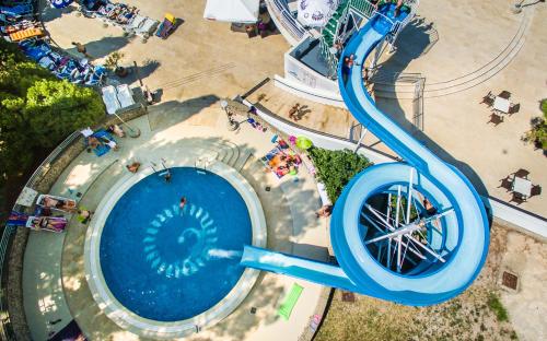 an overhead view of a water slide at an amusement park at Villa Tamaris - Hotel Resort Dražica in Krk