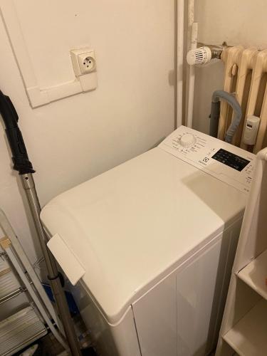 a small hospital room with a white examination table at Le Bretonneau Ledru Rollin in Tours