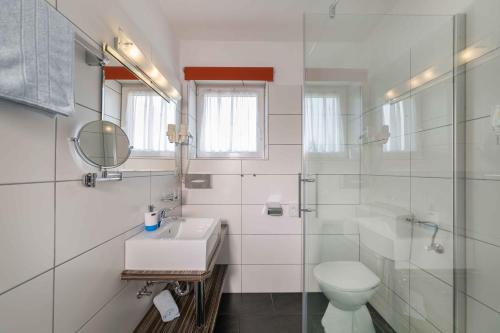 Baðherbergi á Hotel Garni Sohler