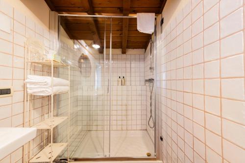 a bathroom with a shower and a sink at Musella Winery & Relais in San Martino Buon Albergo