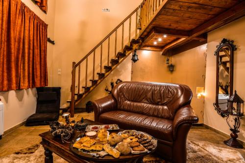 Un lugar para sentarse en Camelia Suites