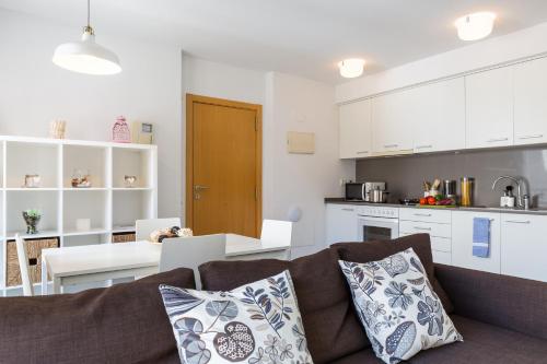 Kuchyň nebo kuchyňský kout v ubytování Apartamentos Cornellalux