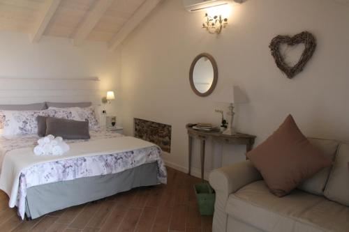 A bed or beds in a room at La Piccola Corte Malpensa, 8 minuti d'auto
