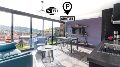 LE COIN COSY avec Balcon Terrasse parking privé et linge de lit compris