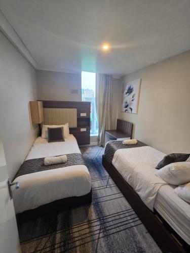 Llit o llits en una habitació de Double bedroom studios