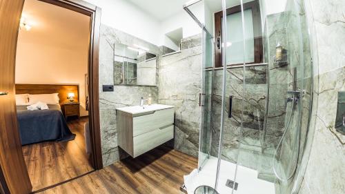 a bathroom with a shower and a sink at Paladini al Casale in Piazza Armerina