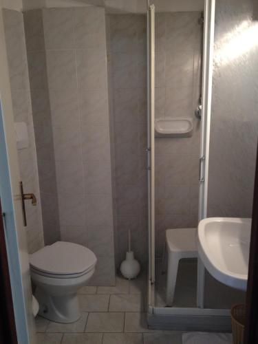 a bathroom with a toilet and a sink at Albergo Anita Alassio in Alassio