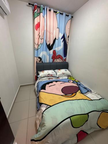 a bedroom with a bed and a curtain at Shinchan homestay in Skudai