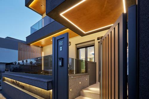a facade of a building with a elevator at Diastar Luxury Suites NEW in Heraklio