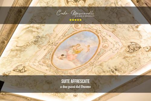 a picture of a ceiling with a painting on it at B&B Costa Masciarelli - Suite affrescate a due passi dal Duomo in LʼAquila
