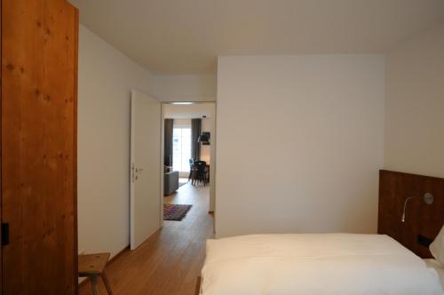 Apartment Nidusにあるベッド