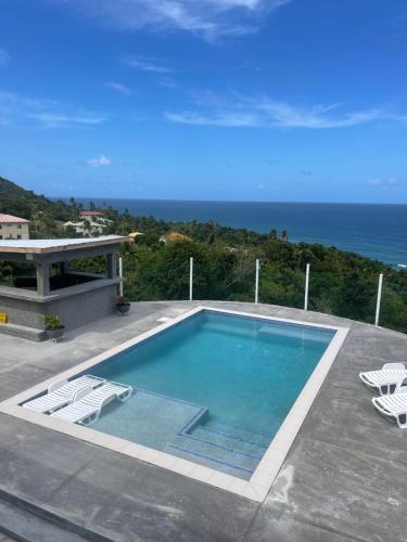 Piscina a Peace Seekers Suite 1 o a prop