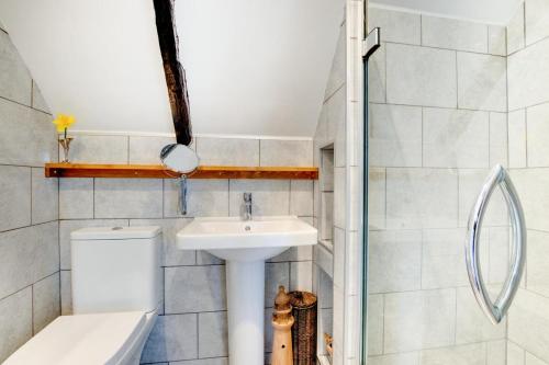 a bathroom with a sink and a toilet at 1 Bed in St. Ives oc-cp5 in St Ives