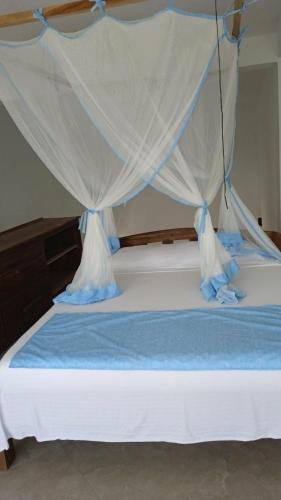 Llit o llits en una habitació de Villalola