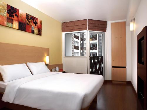 Letto o letti in una camera di Ibis Pattaya