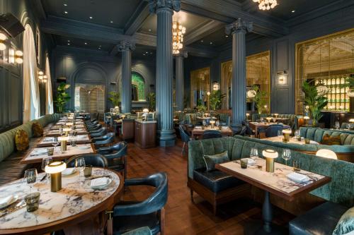 a row of tables in a restaurant with couches at The Westin St. Francis San Francisco on Union Square in San Francisco
