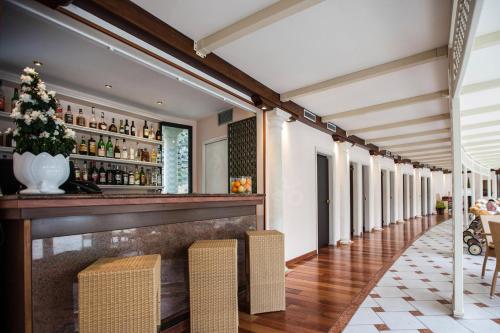 a bar in the hallway of a house at Hotel President Terme in Abano Terme