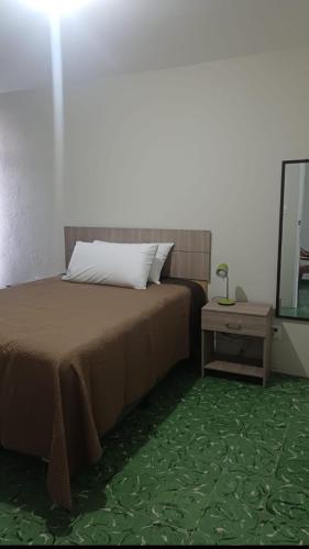 Llit o llits en una habitació de Villa 15