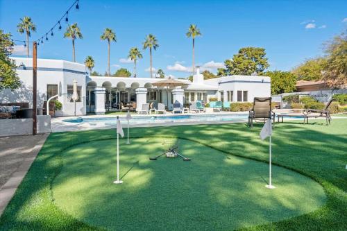 a golf course in front of a house at Live Blissfully in Phoenix