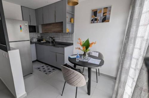 ครัวหรือมุมครัวของ Appartement Confort Plus