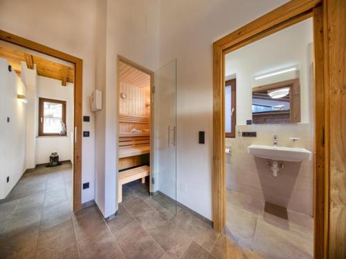 a bathroom with a sink and a shower at Luxury alpine chalet in Neukirchen in Neukirchen am Großvenediger