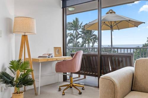 an office with a desk and a chair next to a window at The Rocks Resort Unit 2C in Gold Coast