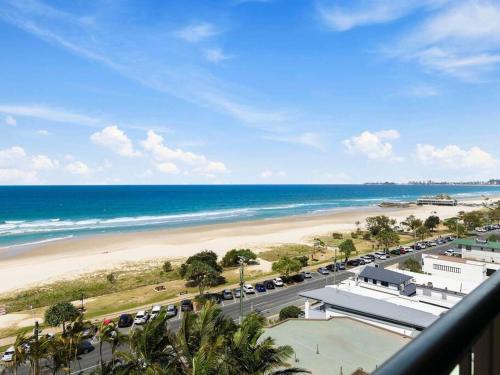 a view of the beach from the balcony of a condo at The Rocks Resort Unit 8G in Gold Coast