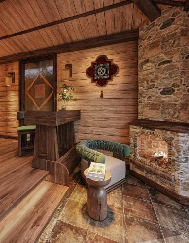 a rendering of a living room with a fireplace at Laxsik Ecolodge in Sapa