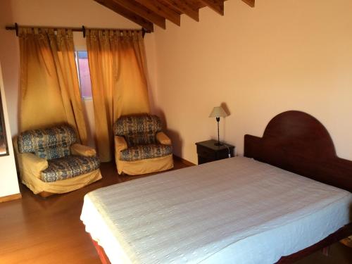 Una cama o camas en una habitación de Vista al Mar Punta Mogotes