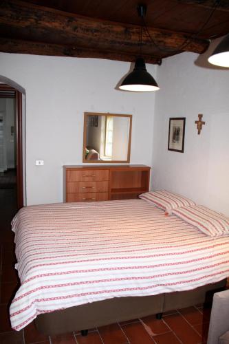 Postel nebo postele na pokoji v ubytování Antico Borgo Camporeso