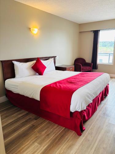 Imperial Motel tesisinde bir odada yatak veya yataklar