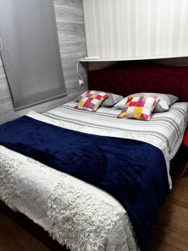 เตียงในห้องที่ Hotels