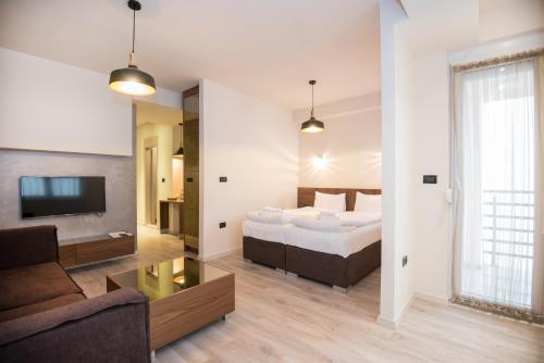 Postel nebo postele na pokoji v ubytování Hotel Vlaho