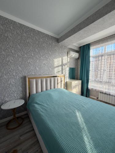 Llit o llits en una habitació de Тихий уголок