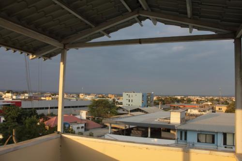 a view of a city from the roof of a building at Hostal Rosa Mar in Manta