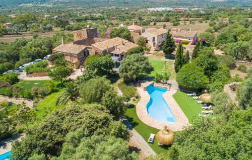 an aerial view of an estate with a swimming pool and a resort at Son Favar in Capdepera