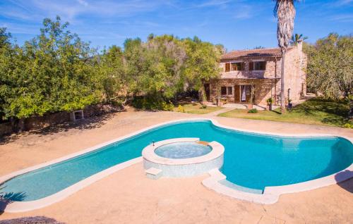 an image of a swimming pool in front of a house at Mirabo Ramonet in Felanitx
