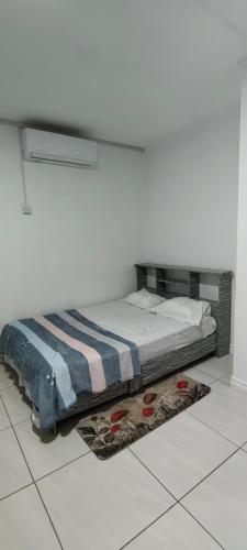 เตียงในห้องที่ Duplex Melville